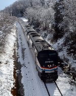 AMTK 145 leads a 4-hour late #20 through the first snow of the 21-22 season under Bedford Avenue 